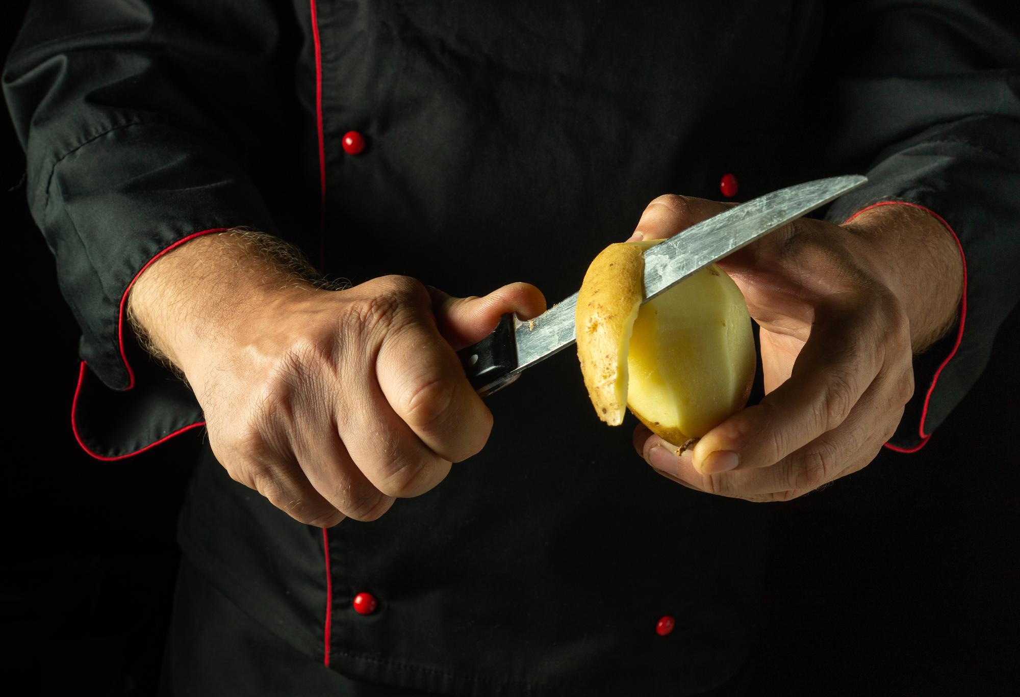 Studio shot of instructor demonstrating a knife technique